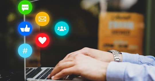 hands clicking on social media