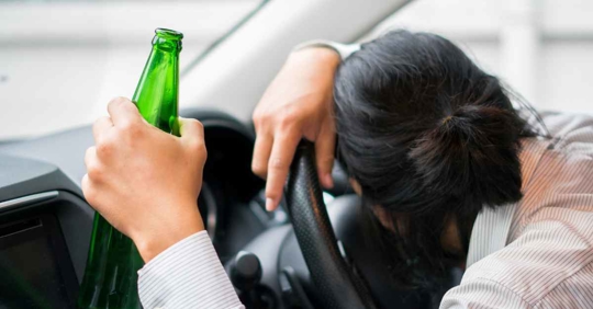 A woman drunk at the wheel