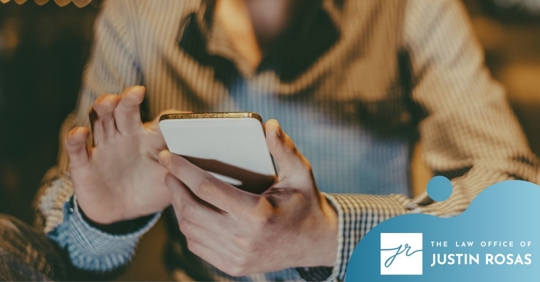 man texting on smartphone