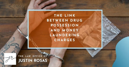 hands showing innocence while handcuffed next to pills and money